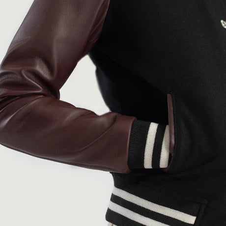 women's black varsity jacket with burgundy sleeves