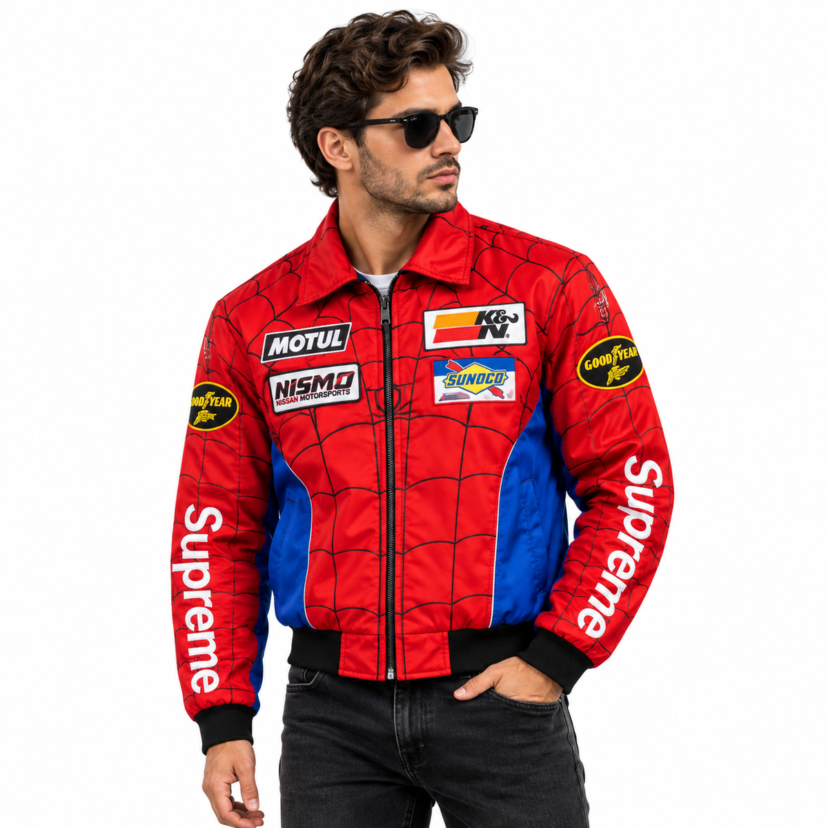 Red and blue racing jacket with web pattern, Supreme sleeve lettering and detailed motorsport patches