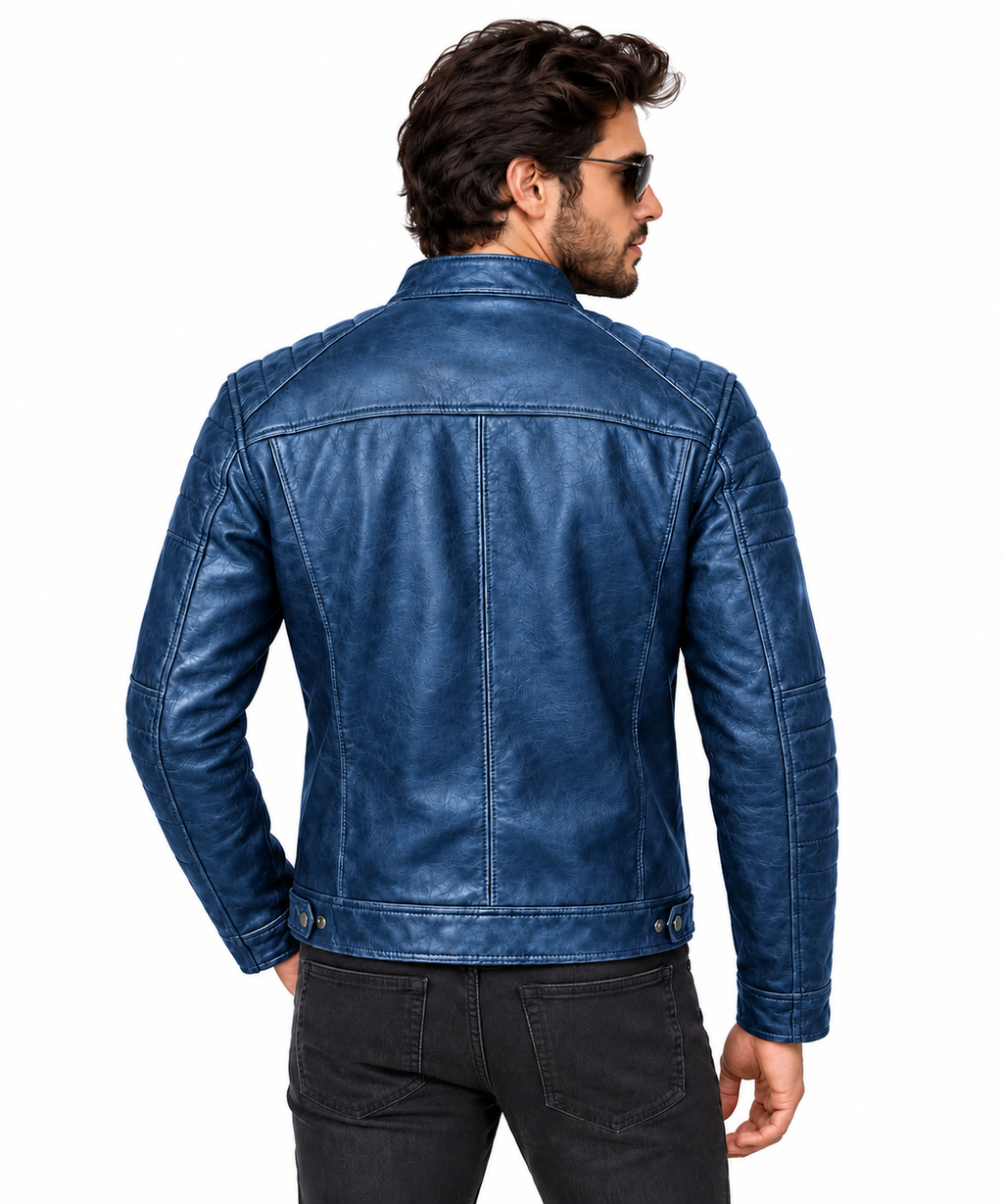 Men's blue leather biker jacket styled with a white T-shirt in a modern outdoor fashion setting.